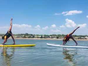 Practicing Paddle Yoga